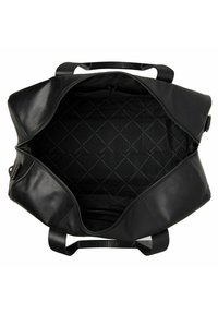 Sac en cuir noir avec une grande ouverture zippée. L'intérieur est doté d'une doublure en tissu matelassé noir, avec une petite poche sur le côté.