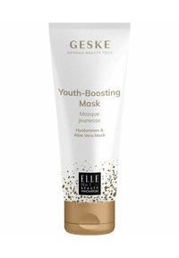 Hvid tube med guld accenter, mærket "Youth-Boosting Mask." Indeholder hyaluronsyre og aloe vera, med et plettet mønster.