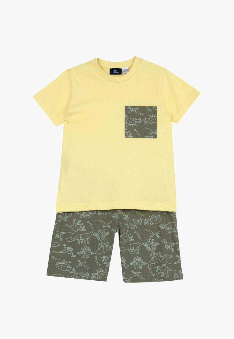 T-shirt en coton jaune avec une poche à motif dinosaure vert, assorti à un short vert arborant un motif dinosaure similaire.