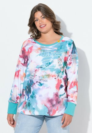 Long-sleeve sweatshirt in a multicolor abstract pattern, featuring fish graphic in white, with turquoise accents on cuffs and neckline.