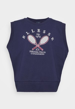 Sudadera sin mangas azul marino con raquetas de tenis cruzadas y texto blanco que dice "ELLESSE DAL 1959 PERUGIA ITALIA LO STILE SPORTIVO."