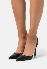 RAID CLEMENTINE - Saltos clássicos - black