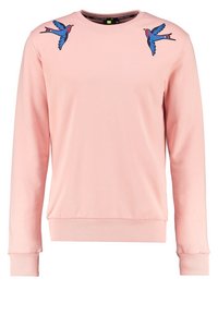 Vaaleanpunainen huppari pitkillä hihoilla, ribbireunuksilla hihoissa ja helmassa, jossa on brodeerattuja sinisiä lintuja olkapäillä. Pehmeä puuvillasekoitemateriaali.