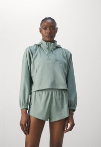 Girlfriend Collective HUMMINGBIRD HALF ZIP - Vjetrovka - chinoiserie