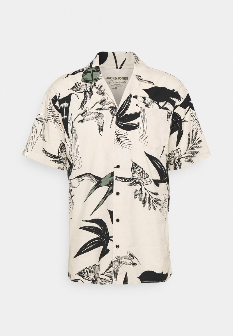 Chemise beige à manches courtes avec boutons, imprimé feuilles tropicales et oiseaux noirs et verts, poche poitrine avant et col camp.