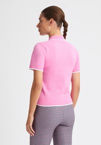 Röhnisch Poloshirts - fuchsia pink