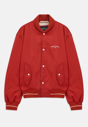 Red bomber jacket with button front, ribbed collar and cuffs, side pockets, and white Emporio Armani Milano logo on chest.