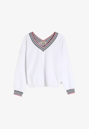 Biała bluza z dekoltem w kształcie litery V, ozdobiona czarnymi i czerwonymi paskami. Elastyczne mankiety i dół, miękki materiał oraz luźny krój.