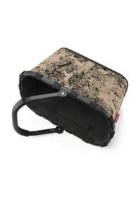 Cesta in tessuto con un design a motivi naturali in nero e beige, manico in plastica nera resistente e tasca interna con zip. Presenta una texture morbida.