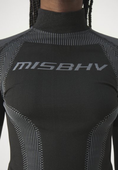 Black form-fitting long-sleeve top featuring a high collar, subtle stripe patterns, and "MISBHV" branding in gray across the chest.
