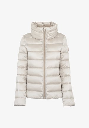 Giacca a vento in beige chiaro con colletto alto, dotata di zip frontale, cuciture orizzontali e una finitura del materiale liscia e lucida.