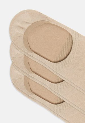 Beige No-Show-Socken mit einer glatten Textur, die einen gepolsterten Zehenbereich und eine elastische Oberkante für einen sicheren Sitz aufweisen. Entwickelt für unsichtbares Tragen.