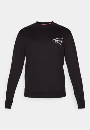 Zwarte longsleeve trui met ronde hals en een klein wit "Tommy Jeans" logo op de linkerborst.