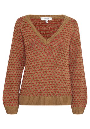 Knit sweater in tan with a V-neck, featuring a textured pattern of small red stars throughout and ribbed cuffs and hem.