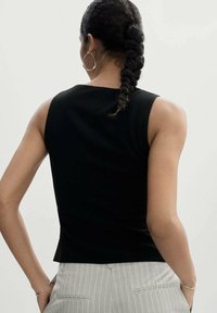Mango Smanicato - black