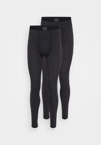 Deux paires de leggings thermiques noirs avec une taille plate. Le tissu est lisse avec une coupe ajustée, présentant un détail de poche à l'avant.