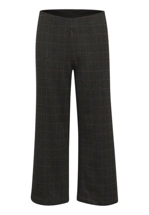 U širokim hlačama od tamnog materijala s uzorkom mreže. Imaju glatki pojas i teksturiranu površinu, ističući elegantan dizajn.