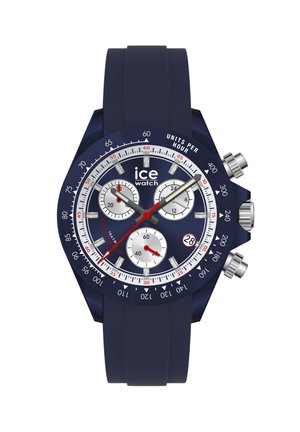 Laivastonsininen Ice Watch kronografi, jossa on kolme apulohkoa, päivämääräikkuna kohdassa 4, hopeiset ja punaiset osoittimet sekä silikoniranneke.