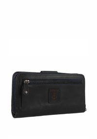 Portafoglio in pelle nera con tasca esterna con zip, logo ancora impresso e interni di colore blu scuro. Presenta una texture liscia e un design strutturato.