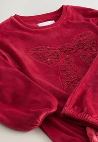Unselected, red sequin bow