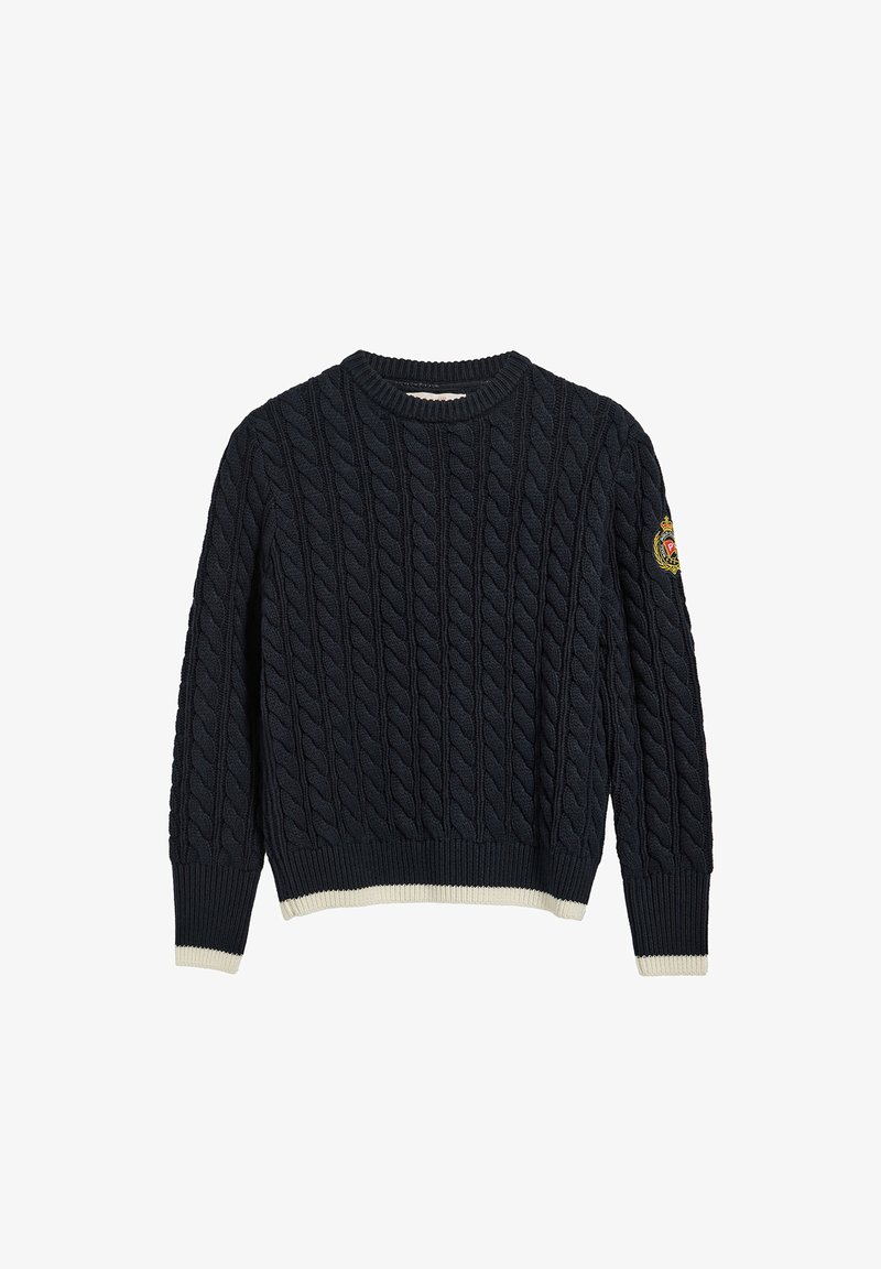 Mörkblå kabelstickad tröja med ribbat rundhals och ärmslut, med krämfärgade detaljer vid fållen och ärmarna.