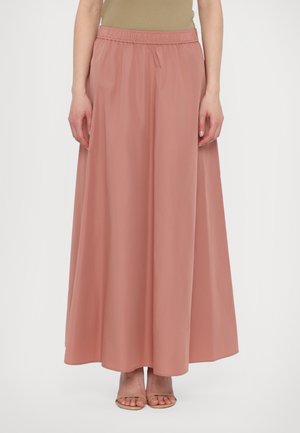 Jupe longue et fluide en tissu léger de couleur rose pastel. Dispose d'une taille élastique et d'une texture lisse. Design simple et élégant.