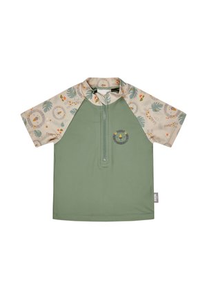 Green short-sleeve children's shirt with zipper front, lion face on chest, and beige sleeves with animal and leaf patterns.