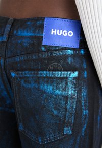 HUGO ELYAH - Straight leg jeans - black