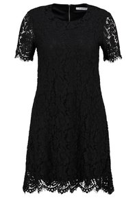 Robe noire en dentelle à manches courtes avec motif floral, encolure ronde, ourlet festonné et fermeture éclair au dos.