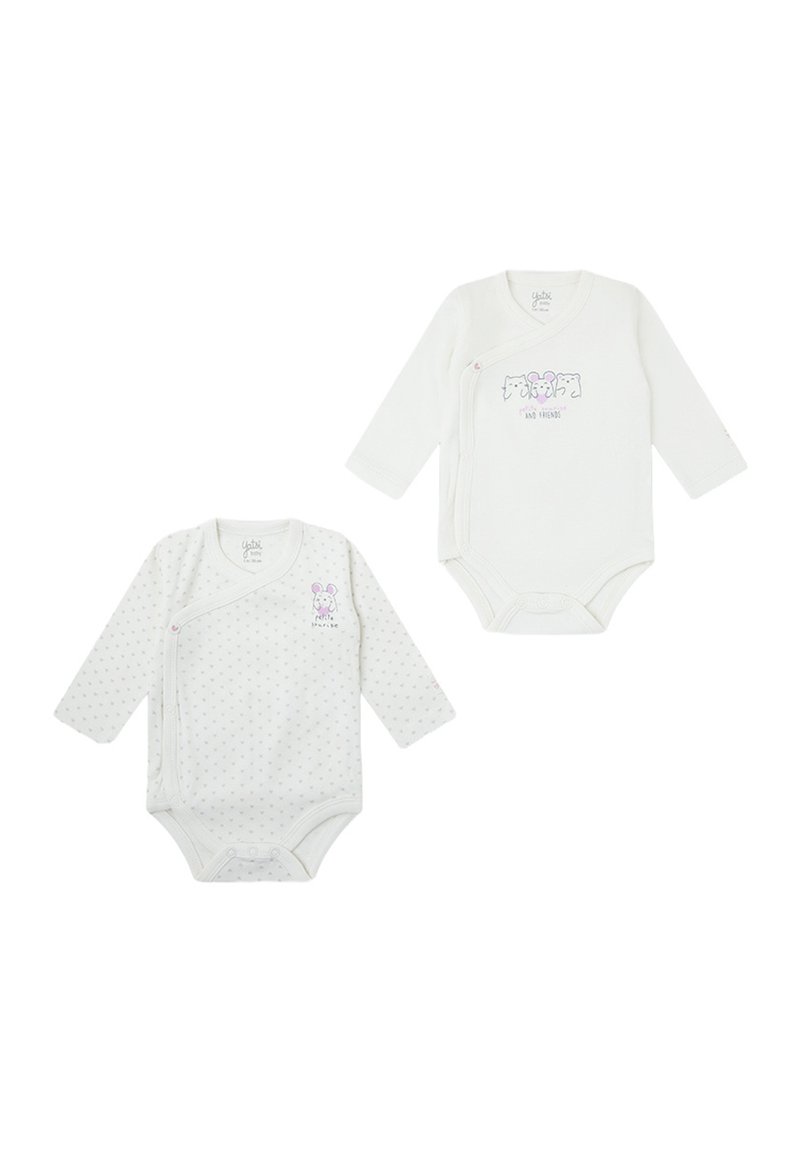 Dos bodies de manga larga para bebé en algodón blanco suave. Uno presenta lunares, el otro tiene un diseño gráfico con animales divertidos.