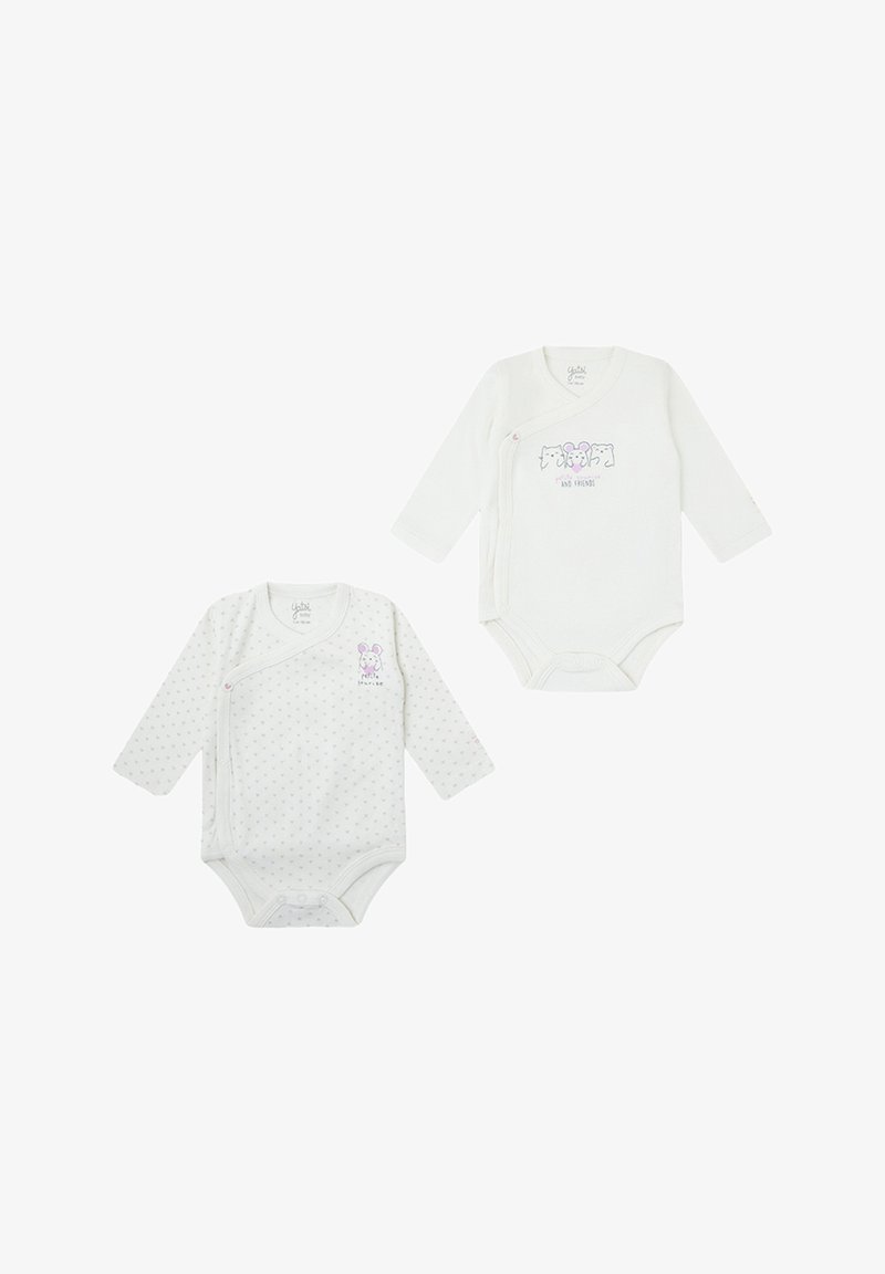 Dos bodies de manga larga para bebé en algodón blanco suave. Uno presenta lunares, el otro tiene un diseño gráfico con animales divertidos.
