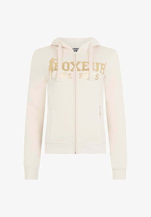Kapuzensweatshirt zum Reißverschluss in weichem cremefarbenem Stoff, mit goldfarbenem Aufdruck von Text und Grafiken. Es verfügt über eine Kapuze mit Kordelzug sowie gerippte Bündchen und Saum.