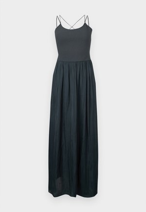 Maxi dress with a fitted dark gray ribbed bodice, thin crossed straps, and a flowing, gathered skirt in a smooth fabric.