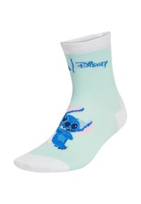 Calzini verde menta chiaro con accenti bianchi, caratterizzati da un personaggio cartone animato blu con grandi orecchie e occhi, e il logo Disney stampato sopra.