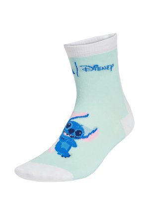 Calcetines de un suave verde menta con acentos blancos, que presentan un personaje de dibujos animados azul con orejas y ojos grandes, y el logo de Disney impreso arriba.
