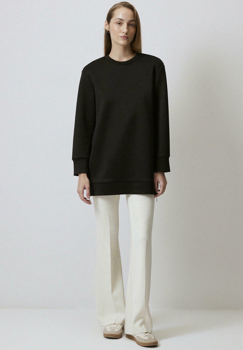 Touché Privé Sweater zwart Touché Privé Sweater zwart