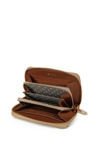 Tan leather wallet with a gold zipper, multiple compartments, and a gray polka dot lining. Features card slots and a zippered coin section.
