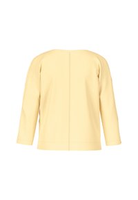 Yellow, long-sleeve top with a round neckline and back seam detail. Made from soft fabric, featuring a relaxed fit and no visible hardware.