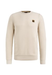Sweatshirt beige texturé avec un col rond, des poignets et un ourlet côtelés ; il présente un petit logo noir et jaune sur la poitrine.