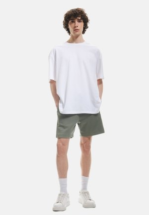 DRAWSTRING - Træningsbukser - green