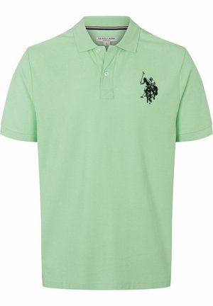 Light green short-sleeve polo shirt with collar, two buttons, and black horse polo player logo on the left chest.