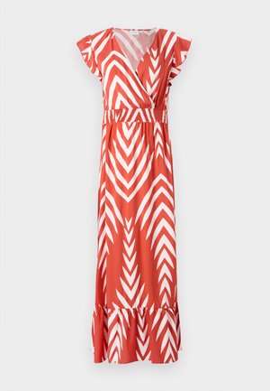 Piros ruha fehér cikkcakk mintával, rövid fodros ujjak, gumírozott derék és fodros szegély. Könnyű anyagból készült, térd fölött ér.