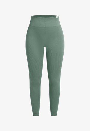 Leggings acanalados de cintura alta en verde apagado. Tejido elástico y suave con una textura lisa. Piernas ceñidas sin cierre visible.