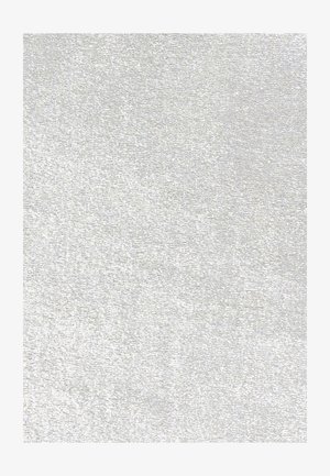 Surface blanche texturée avec des motifs subtils et irréguliers rappelant des fibres de tissu ou de papier.