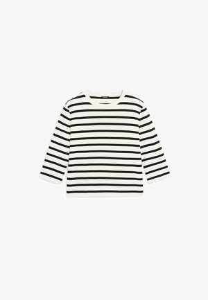 Jasna kremowa bluzka z długim rękawem w czarne poziome paski, wykonana z bawełnianej tkaniny; posiada okrągły dekolt i luźny krój.
