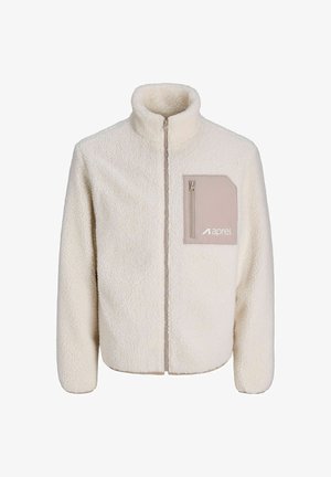 Giacca in pile color crema con colletto alto, zip intera e tasca beige sul petto sinistro dotata di una piccola zip.