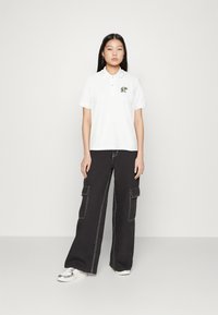 Lacoste LACOSTE X NETFLIX - Polo - white