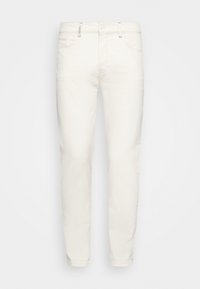 Valkoiset denimpöksyt, kapealla istuvuudella. Edessä taskut, vyölenkit ja vetoketjullinen nappisuljin. Sileä pinta, vähäiset yksityiskohdat.