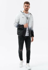 Ombre LIGHTWEIGHT SPORTS WITH EFFECT - Chaqueta de entrenamiento - black