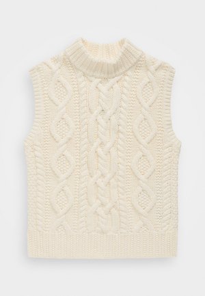 Gilet sans manches crème en tricot avec un col haut côtelé, des motifs en torsades et des détails texturés sur l'ensemble du tissu.